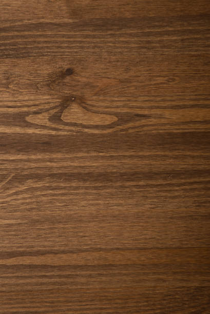 istock Dark Brown wood plank wall texture background 1258432066