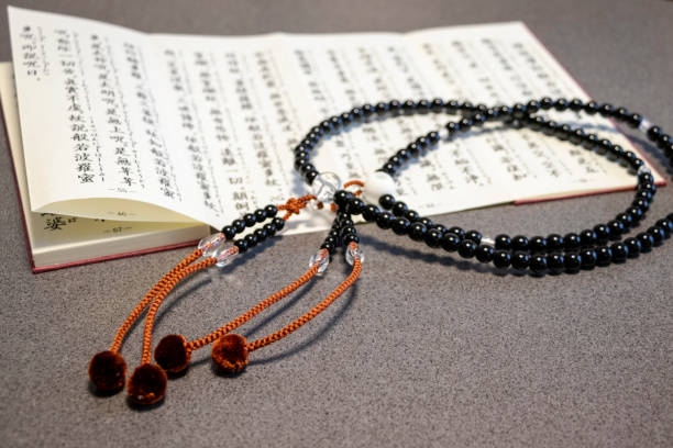 istock Rosary and sutra book for Japanese Buddhist temples on the table 1258462673
