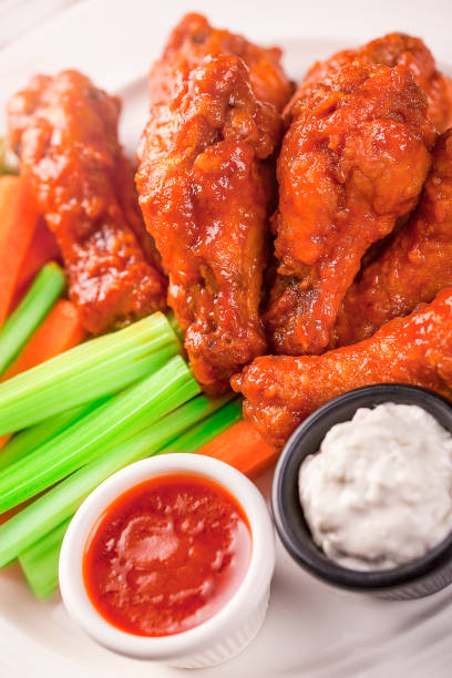 istock Chicken wings with spicy sauce 1258478932