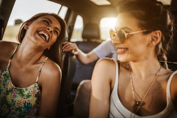 istock Girlfriends having fun on  summer road trip 1258504387