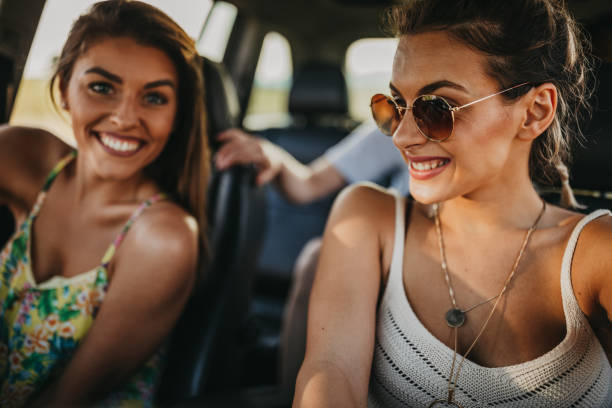 istock Girlfriends having fun on  summer road trip 1258506223