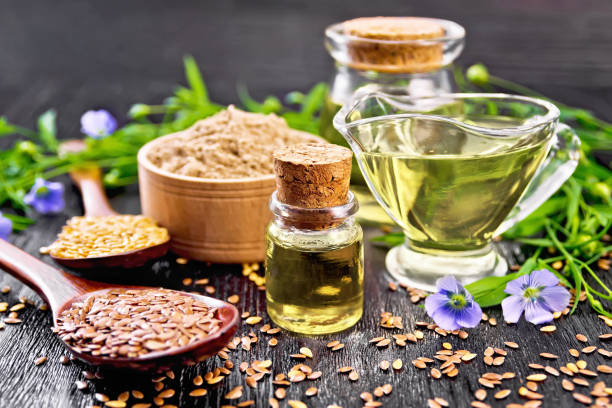 istock Oil flaxseed with flour and seeds on board 1258511463