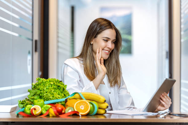 istock Dietician makes video calls with her clients during the covid-19 process. 1258543280