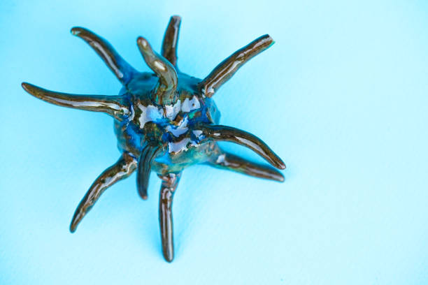 istock Coronavirus mutation a new version coming up on blue background 1258583640