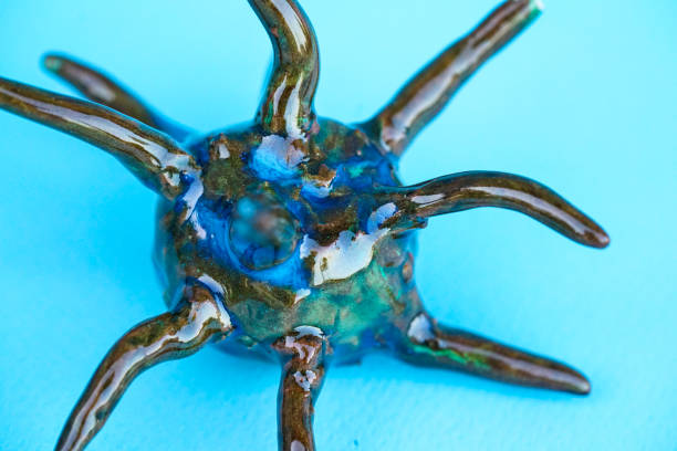 istock Coronavirus mutation a new version coming up on blue background 1258585921