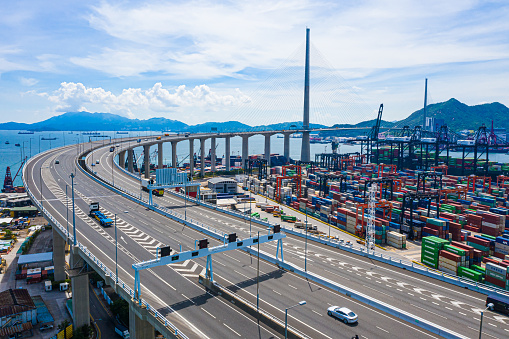 Colorful containers in container terminal, trade Industry Hong Kong China. Top view drone aerial shot.