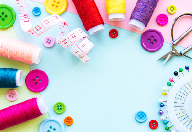 istock Sewing accessories on a blue pastel background 1258602991
