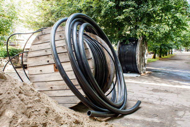 istock two large wooden industrial reels with cable 1258676869
