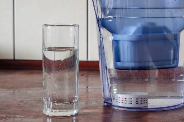 istock Water filter jug with shungite cartridge inside on the kitchen counter. 1258678506