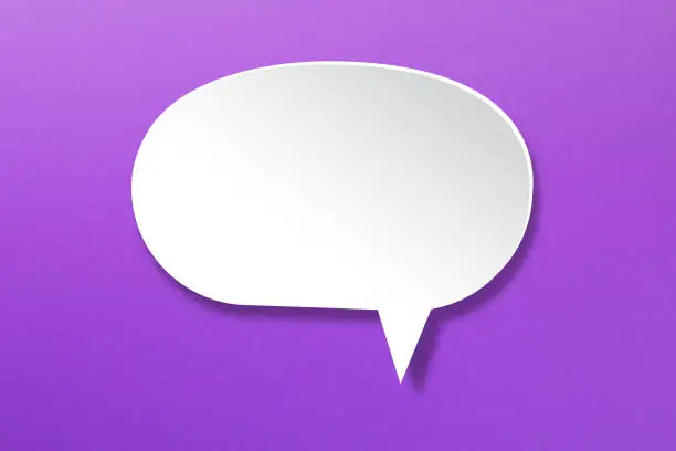 Photo of Blank white speech bubble on purple background