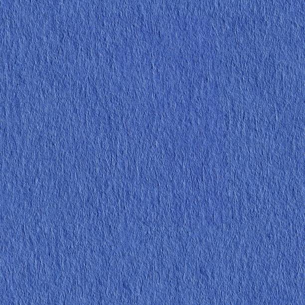 istock Seamless square. Background from a blue paper. High quality texture. Tile ready. 1258704320
