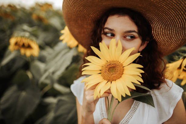 istock Summer vibes in sunflower field 1258733685