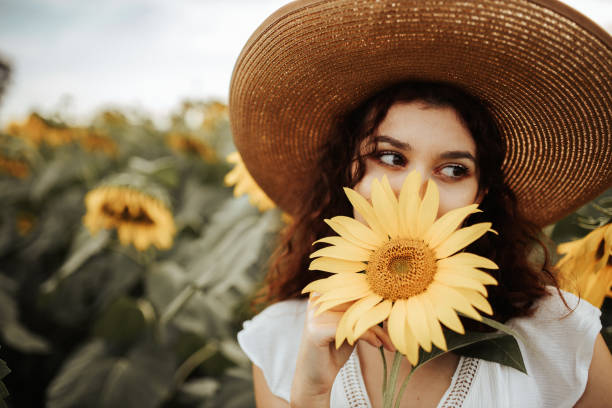istock Summer vibes in sunflower field 1258733719