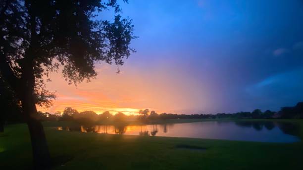istock Sunrise over a tropical lake 1258733872