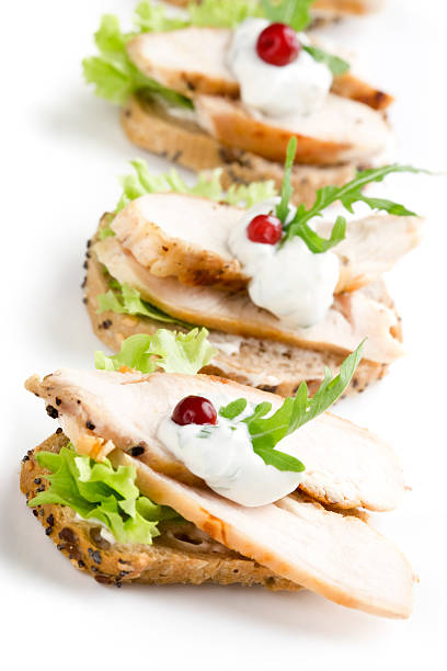 Sandwiches isolated on white[url=http://www.istockphoto.com/search/lightbox/6917851/][img]http://img535.imageshack.us/img535/1977/finetitle.jpg[/img][/url]