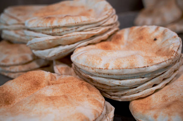 istock Kuboos or khubz - fresh pita bread togeather in a table 1258745728