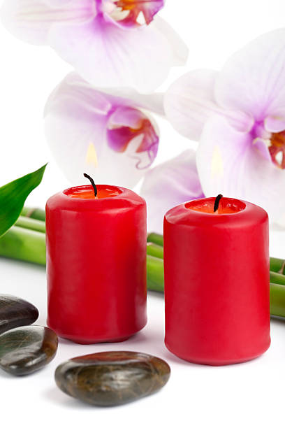 istock Red candles and orchid arrangement 125880896