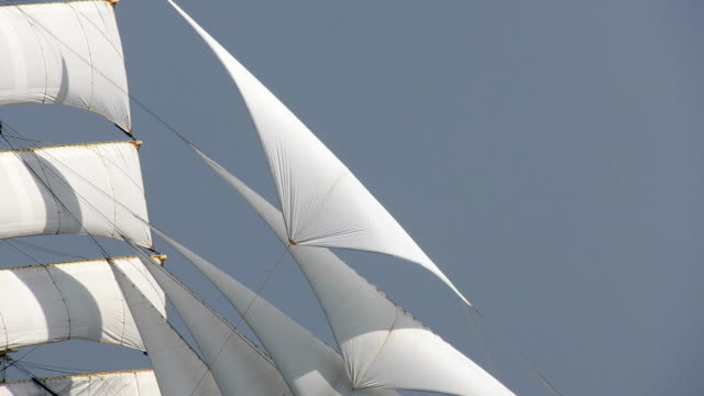 background - passing sails of an old ship