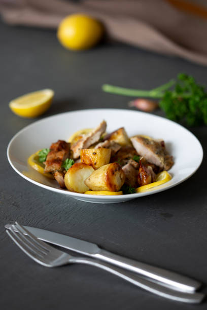 istock Greek Style Roasted Chicken & Potatoes 1258830023
