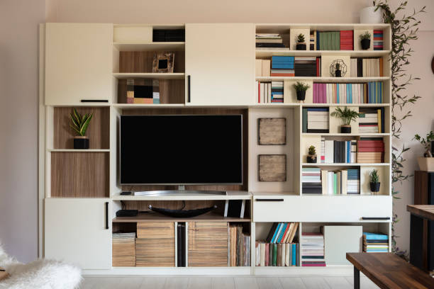istock TV Wall Unit in living room with table 1258855108