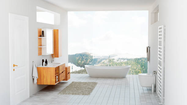 istock Modern bathroom with bathtub and view of the mountains 1258859865