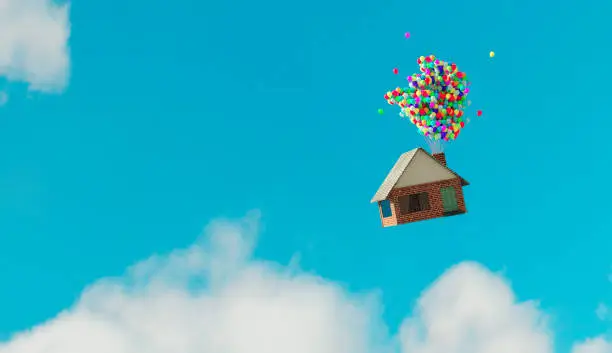 Photo of House flys away up in the air thanks to helium balloons