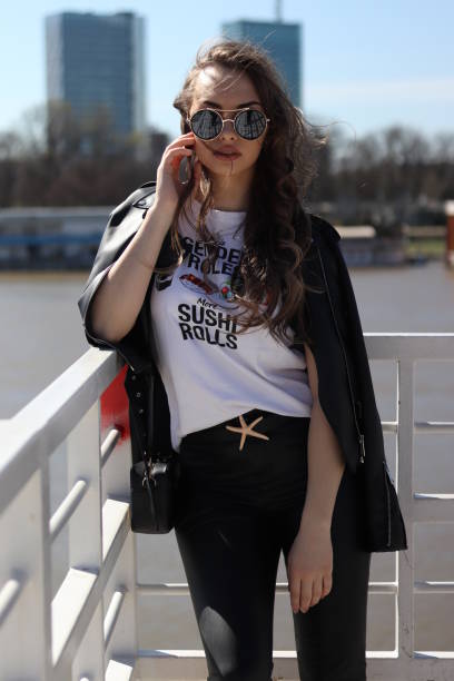 istock Beautiful Girl Wearing Sunglasses 1258874679