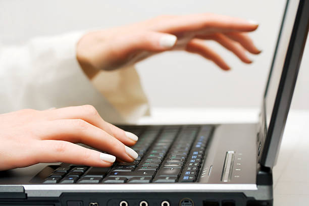 istock Female hands working on laptop 125888803