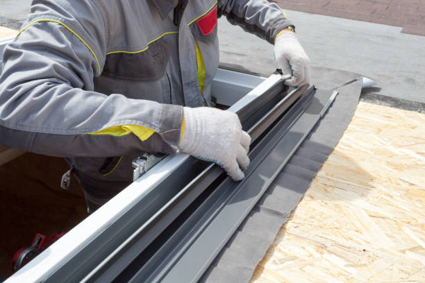 Man fix the window frame for mansard room Concept of house under construction. Cropped view of professional worker man checking sealing rubber at new window frame for mansard room, working at wooden rooftop skylight stock pictures, royalty-free photos & images