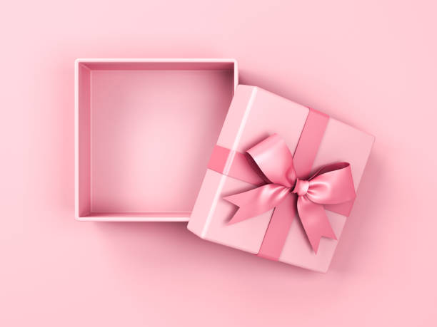 istock Blank pink pastel color present box or open gift box with pink ribbon and bow isolated on pink pastel color background with shadow top view 1258890076