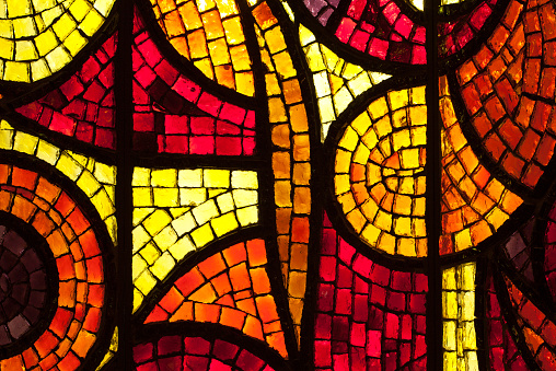 Stained glass windows in the Saint-Lô church, a 19th century Catholic church located in Bourg-Achard in Eure, Normandy.