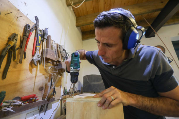 istock A carpenter working in his work shop. 1258893800