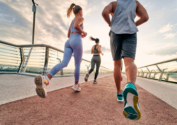 istock Group of people running 1258908291