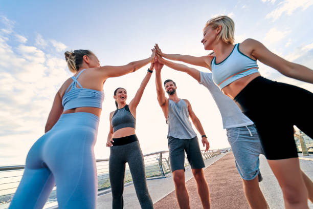 istock Group of people running 1258908393