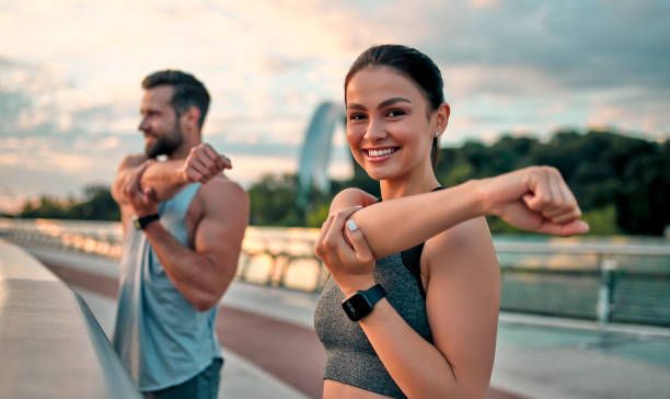 istock Couple doing sport on the street 1258908417