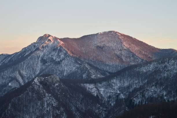istock Fading sunlight  illuminates mountain peak Konjevaca on Southern Velebit, Lika County. 1258925321