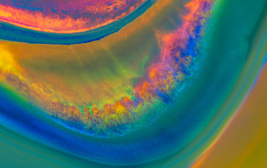 Macro shot of Colorful fluid acrylic paint