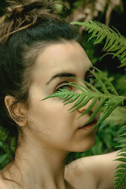istock Girl in green 1259002100