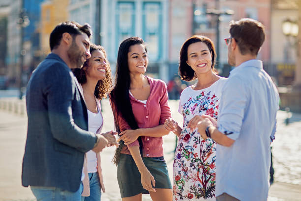 istock Happy friends are talking and having fun together 1259003680