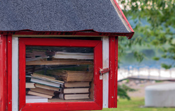 Free book sharing mini house near the river.