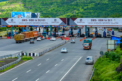 Pune, India - July 26 2020: Toll plaza on the Mumbai Pune expressway near Pune India. The expressway is also known as the Yeswantrao Chavan Expressway.