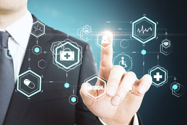 istock Businessman pushing creative glowing medical interface hud hologram. 1259038388