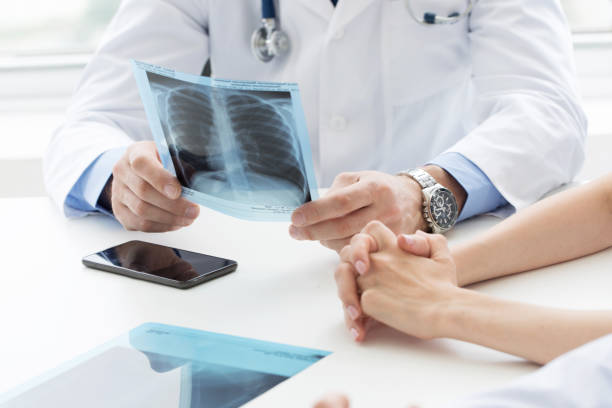 istock Team of expert doctors with x-ray 1259038538