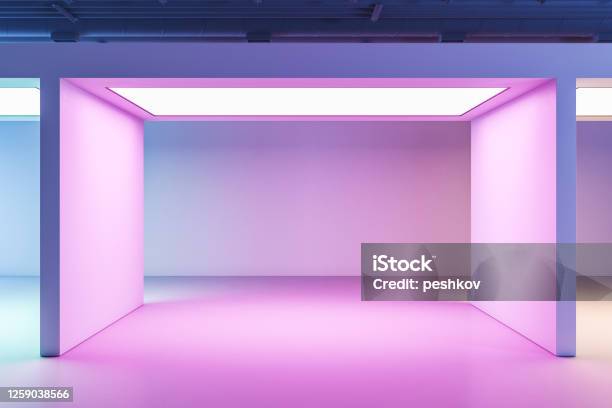 Minimalistic Gallery Interior With Color Backlight And Blank On Wall Stock Photo - Download Image Now
