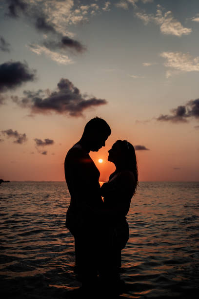 istock Lovely couple at the beach 1259039651