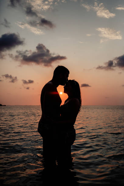 istock Lovely couple at the beach 1259039657