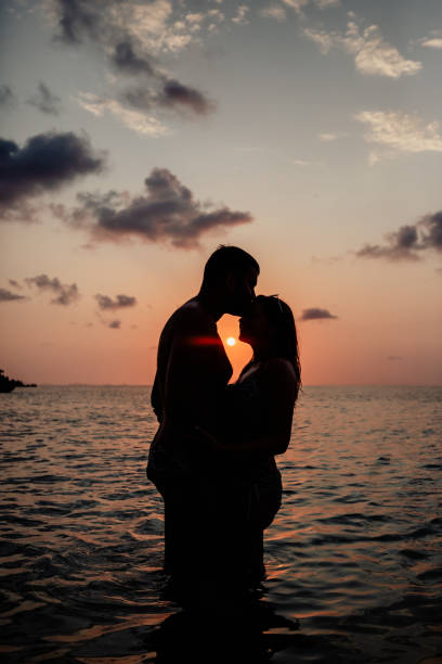 istock Lovely couple at the beach 1259039658