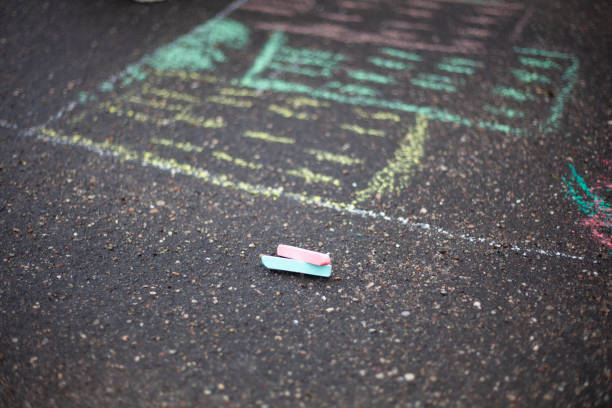 istock Crayons lie on the asphalt. 1259041684