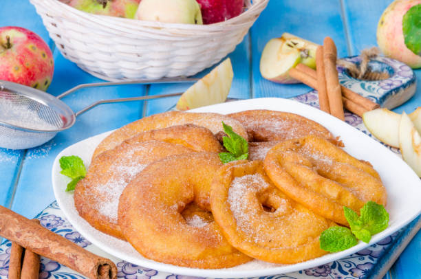 istock Apples fried in a batter with cinnamon and powdered sugar 1259043752