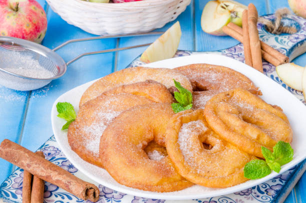 istock Apples fried in a batter with cinnamon and powdered sugar 1259043757